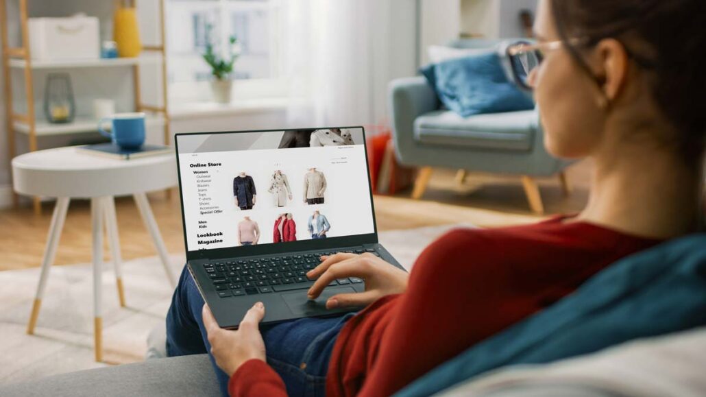 A person on their laptop looking at a company store