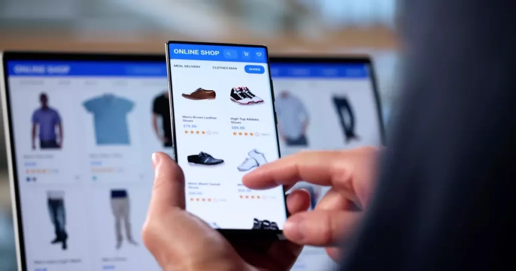 Someone doing online shopping on a laptop and phone.