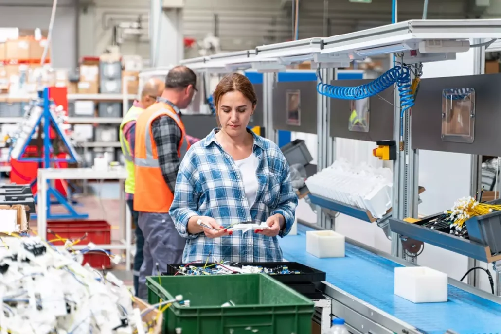 Workers on an assembly line.