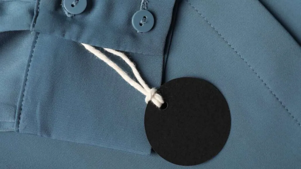 A shirt cuff with a blank tag.
